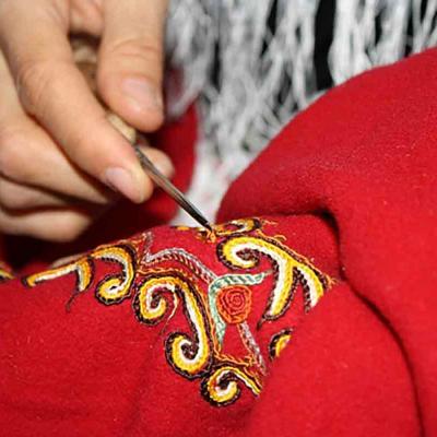 Persian ethnic and traditional art of crocheting on fabric