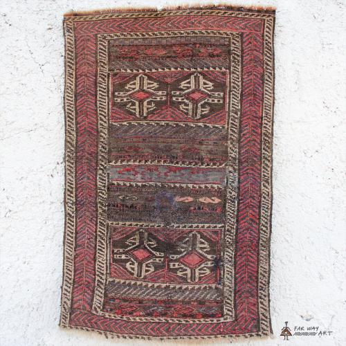 Antique small Persian rug